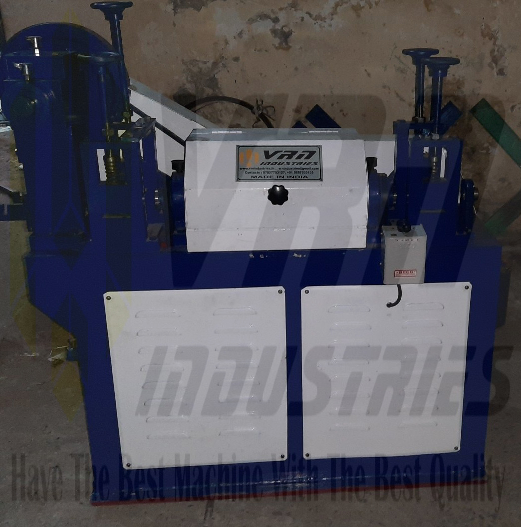 WIRE STRAIGHTENING AND CUTTING MACHINE.